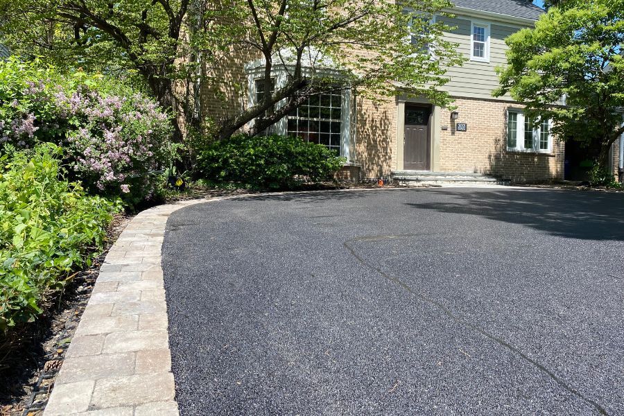 Top 5 Signs Your Driveway Needs Professional Asphalt Repair blog image
