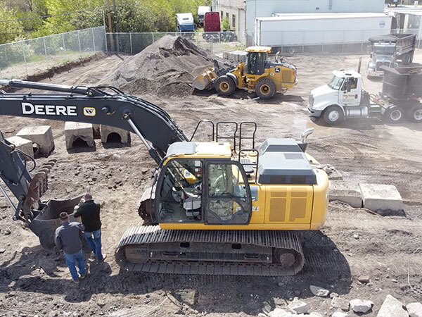 Total Paving backhoe