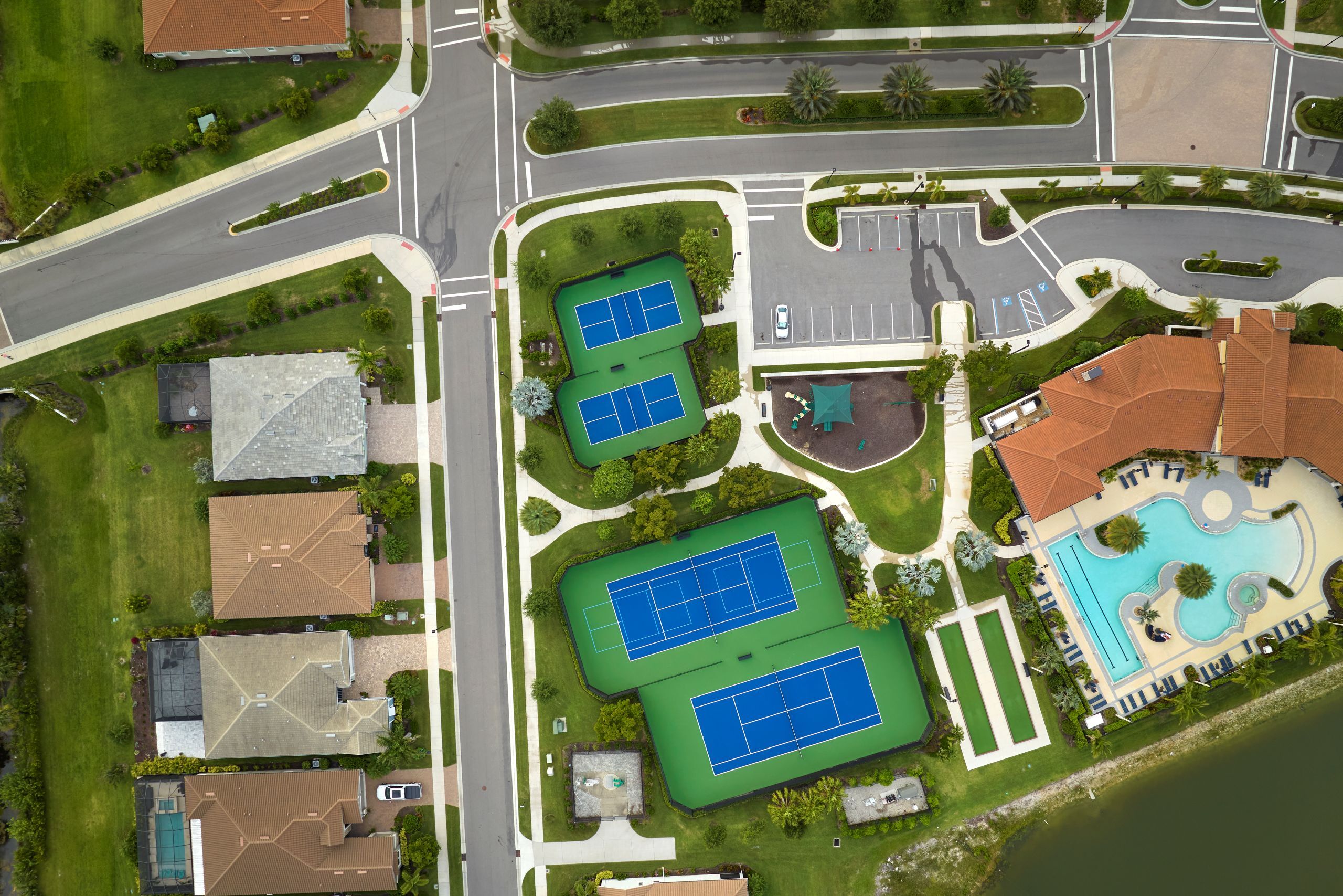 aerial-view-of-blue-tennis-courts-for-sports-commercial-services